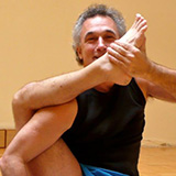 man practicing yoga